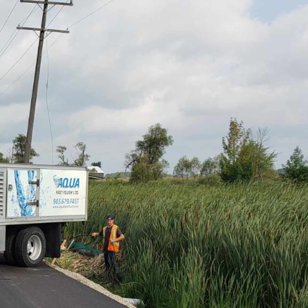 arming-and-Agriculture-Drain-Maintenance Technician Doing a site assessment.