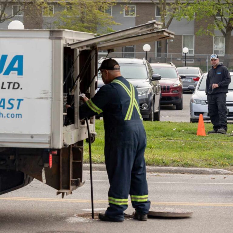 Aqua Fast Flush Employee Reviewing Drain Flushing Plan