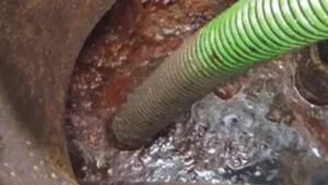 Cleaning an industrial grease trap