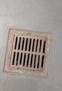 Commercial Area Drain on ground.