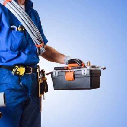 A drain cleaning technician