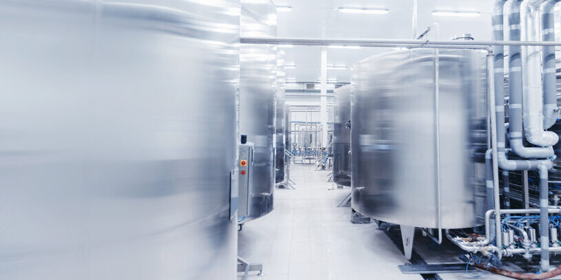 food-and-beverage-industry industrial silver metal tanks in a sterile environmnet
